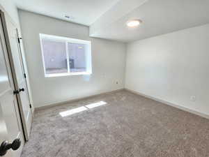 Empty room with light carpet