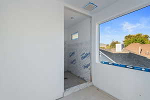 Interior space featuring concrete flooring