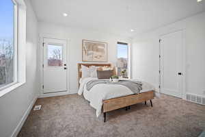 View of carpeted bedroom