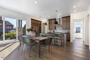 Dining space featuring dark hardwood / wood-style flooring