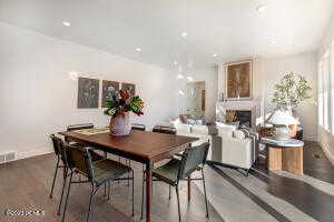 Dining area with hardwood / wood-style flooring