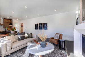 Living room featuring dark hardwood / wood-style flooring