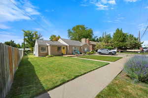 View of front of property featuring a front lawn