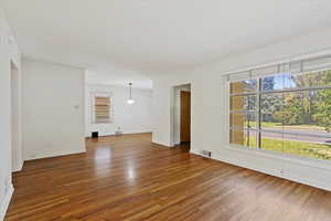 Empty room with wood-type flooring