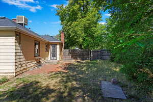 View of yard featuring central AC