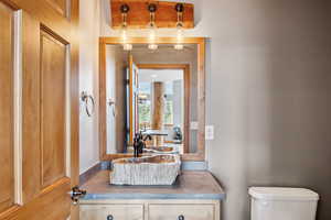 Bathroom with vanity and toilet