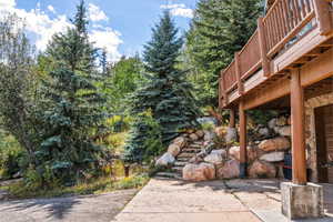 View of yard with a wooden deck