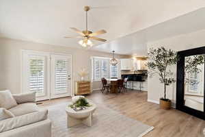 Living room with french doors to backyard