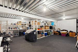 Incredible fully finished storage room with built in shelving