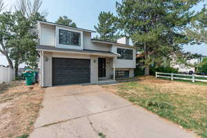 View of front of house with a front lawn