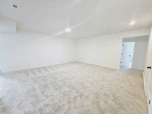 View of carpeted spare room