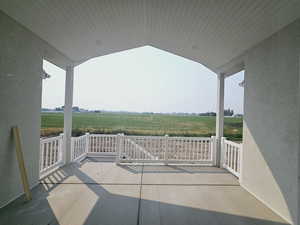 View of patio / terrace with a rural view