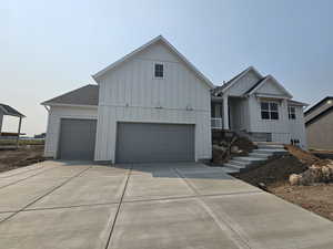 View of front of property with a garage