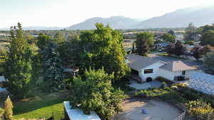 Birds eye view of property with a mountain view