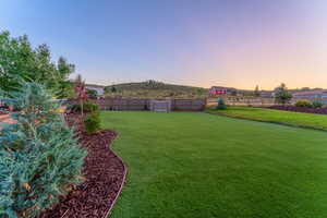 The flat yard serves as a soccer pitch in the summer and an ice rink in the winter.