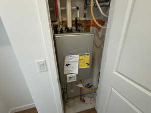 Utility room with tankless water heater