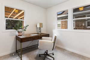 Office area featuring carpet floors