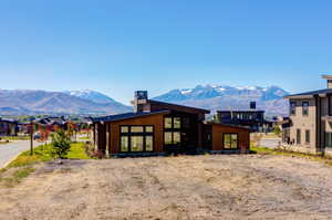 Exterior space featuring a mountain view