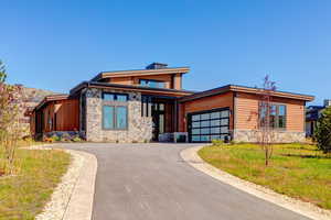 View of front of house with a garage