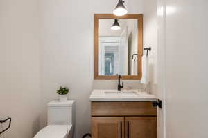 Bathroom with vanity and toilet