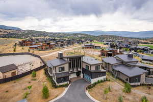 Birds eye view of property featuring a mountain view