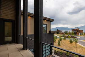 Balcony featuring a mountain view