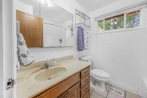 Full bathroom featuring remodeled tub/shower