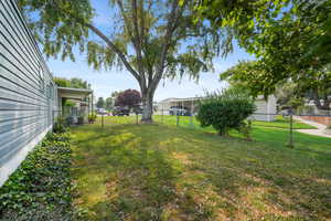 View of yard with central AC