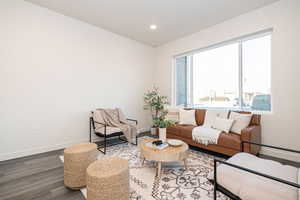 Living area featuring hardwood / wood-style flooring