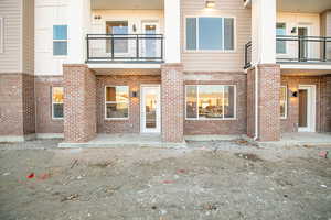 Rear view of property with a patio area