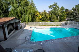 View of pool featuring a patio area