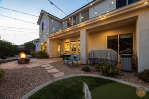 Exterior space featuring area for grilling and an outdoor fire pit