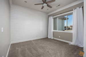 Office/Living Room with carpet flooring, ornamental molding, and ceiling fan