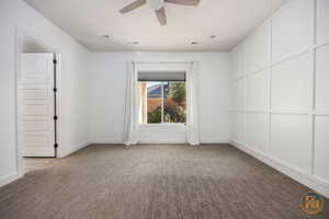 Master Bedroom with ceiling fan and carpet floors