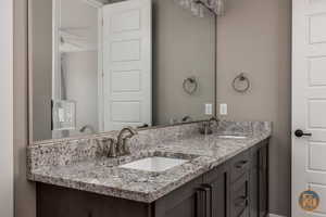 Bathroom 5 - featuring ceiling fan and vanity