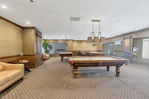 2nd Floor.Rec room with crown molding, billiards, and carpet