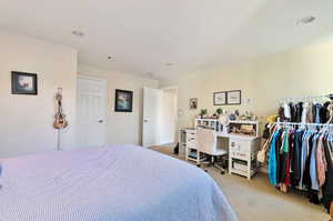 Master Bedroom featuring light colored carpet