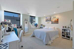 Master Bedroom with light carpet