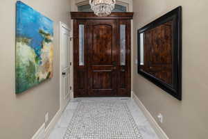 Doorway with an inviting chandelier