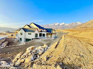 Exterior space featuring a mountain view