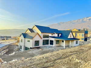 View of front of house featuring a mountain view