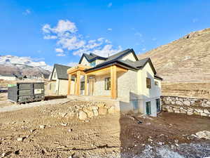 View of front of house with a mountain view