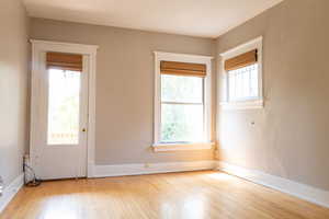 Empty room featuring light wood-type flooring