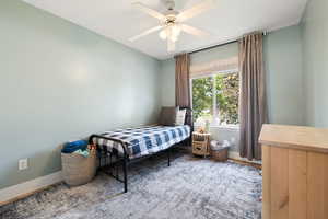 Bedroom featuring ceiling fan