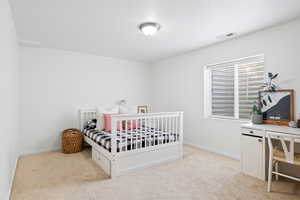 View of carpeted bedroom