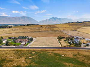 Drone / aerial view with a mountain view and a rural view