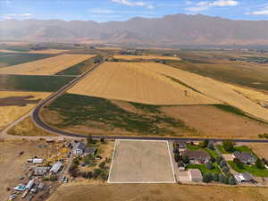 Drone / aerial view featuring a mountain view and a rural view