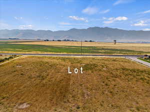 Property view of mountains with a rural view