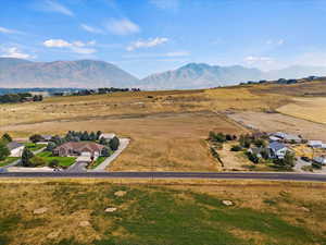 Drone / aerial view with a mountain view and a rural view