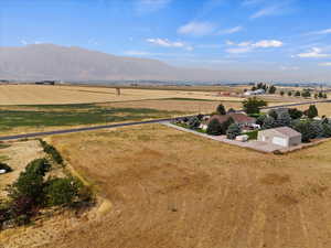 Birds eye view of property with a mountain view and a rural view